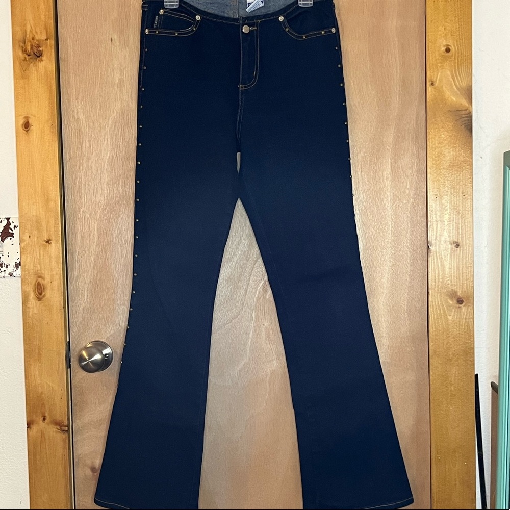 Flare jeans with brass stud detail like new